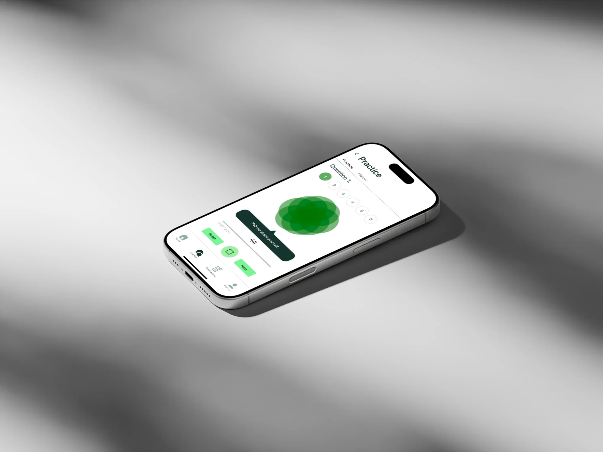 A phone lying flat, showing a practice interview question